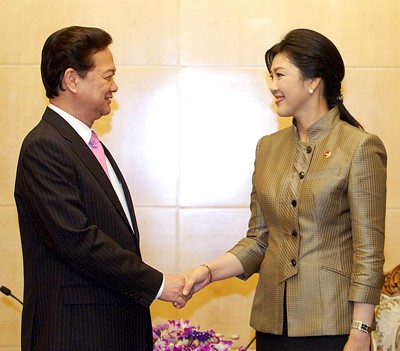 นายกรัฐมนตรีเวียดนามNguyễn Tấn Dũngเข้าร่วมการประชุมระดับสูง ที่ประเทศลาว - ảnh 3